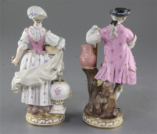 A pair of Meissen porcelain figures of gardeners, late 19th century, height 19cm, slight losses